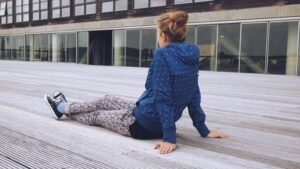 teenage girl sitting on steps